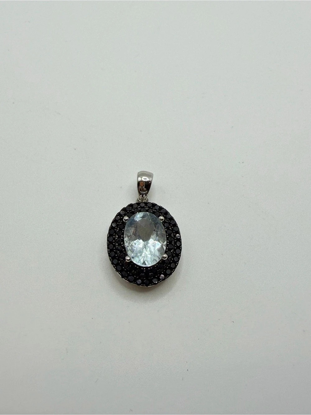 Sterling silver light blue and dark blue rhinestone circle pendant